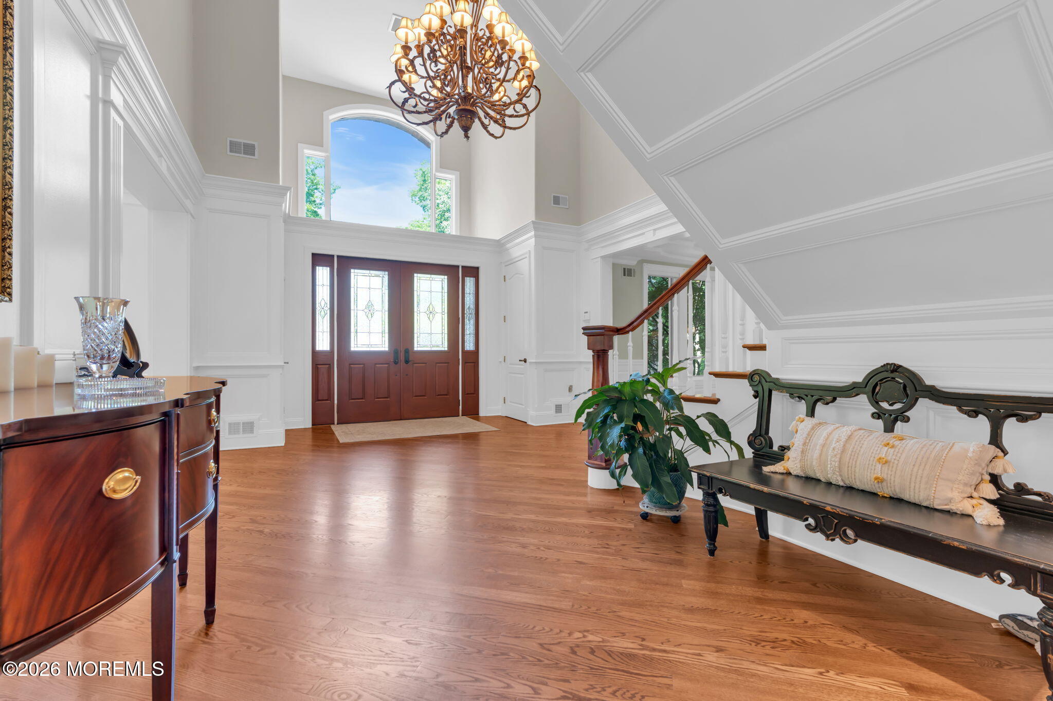 672 Winding River Road Brick, NJ 08724 - Photo 18 of 111 a living room with furniture and a chandelier