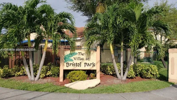 a sign on the side of a road