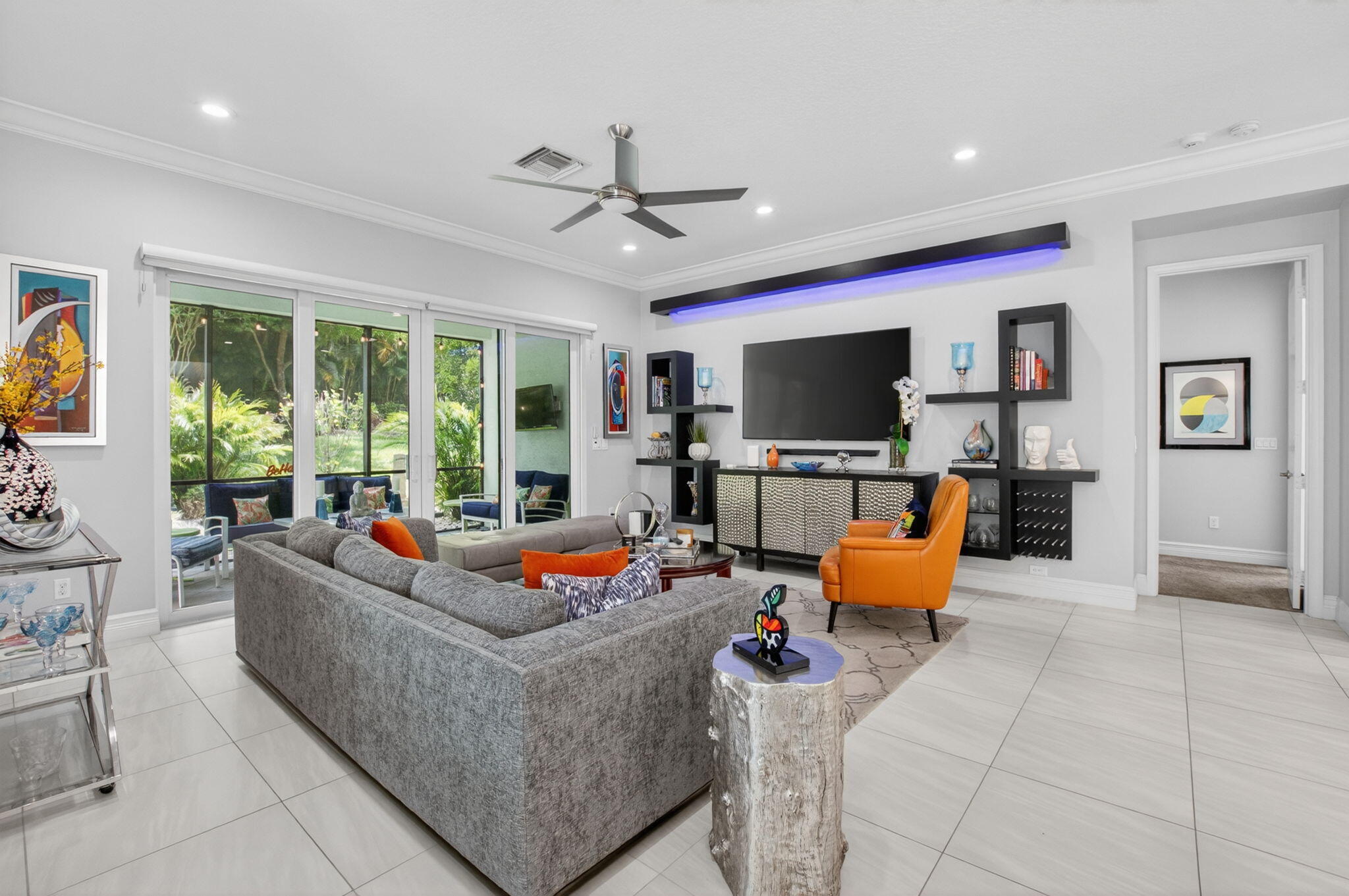 8263 Arabian Range Road Boynton Beach, FL 33473 - Photo 15 of 52 a living room with furniture and a flat screen tv