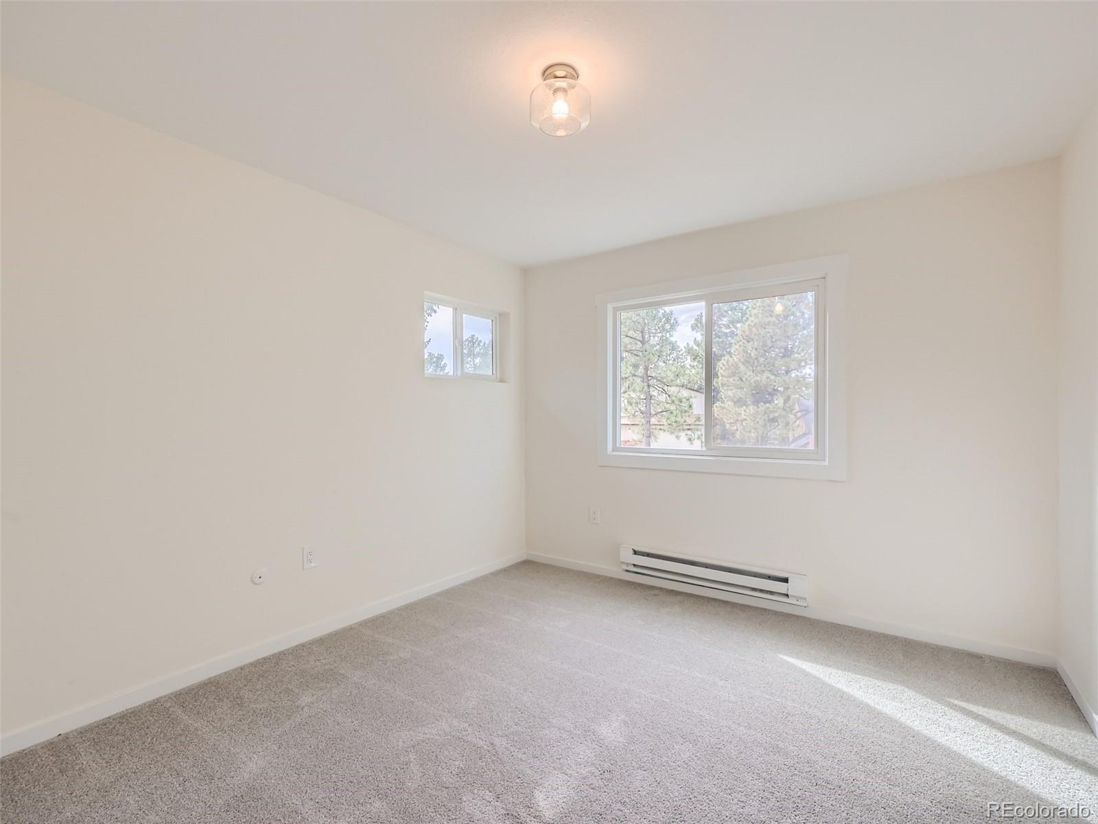6124 Powell Road Parker, CO 80134 - Photo 26 of 50 an empty room with a window
