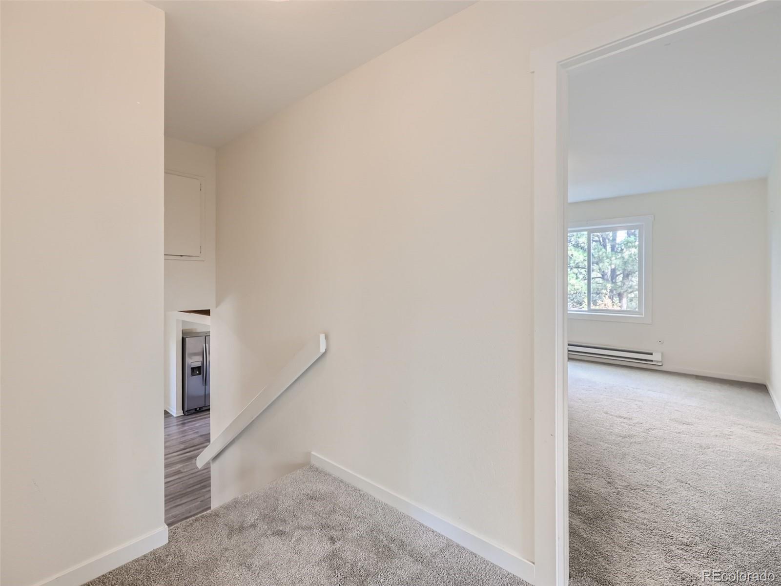 6124 Powell Road Parker, CO 80134 - Photo 28 of 50 an empty room with windows