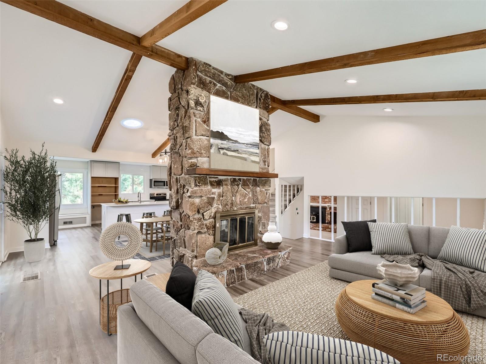 6124 Powell Road Parker, CO 80134 - Photo 46 of 50 a living room with furniture a fireplace and a flat screen tv
