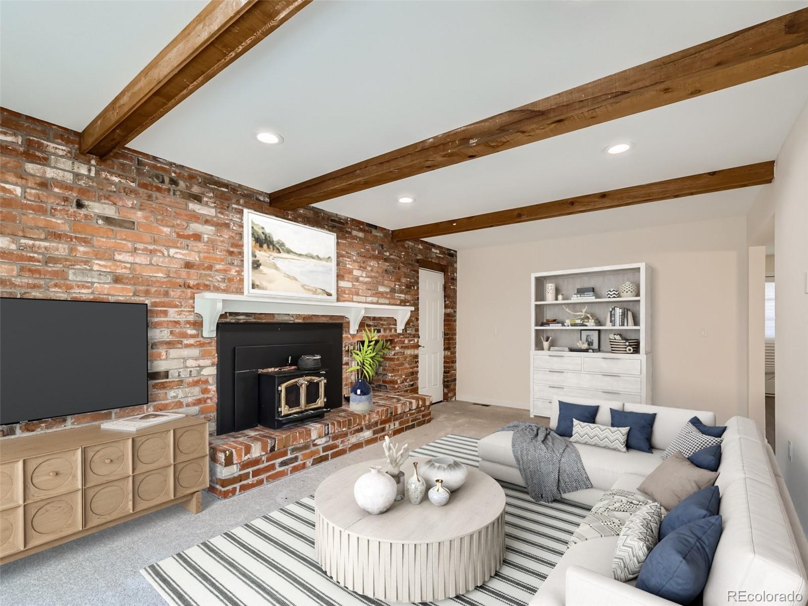 6124 Powell Road Parker, CO 80134 - Photo 49 of 50 a living room with furniture and a fireplace