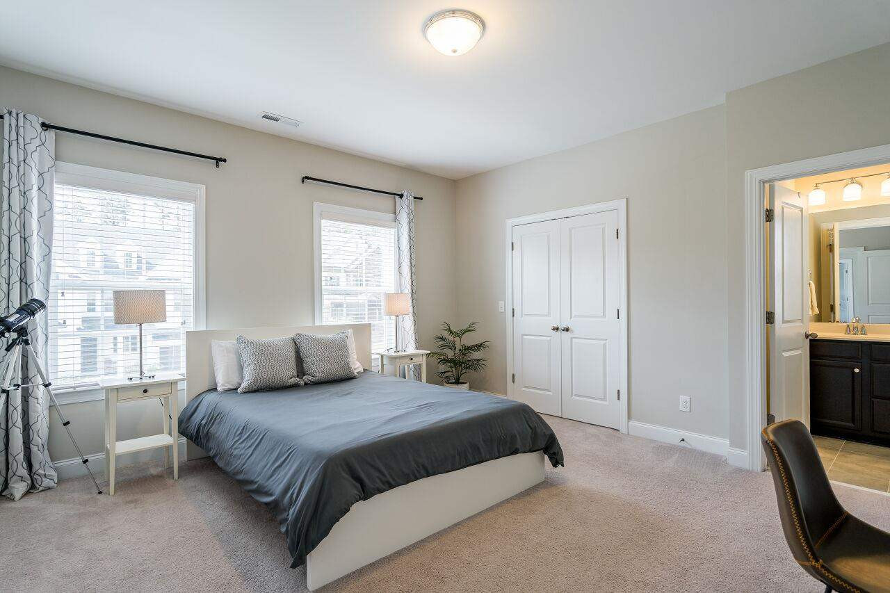 5264 Aleppo Lane Raleigh, NC 27613 - Photo 25 of 30 Front facing upstairs bedroom with en suite bath. Upstairs Bedroom