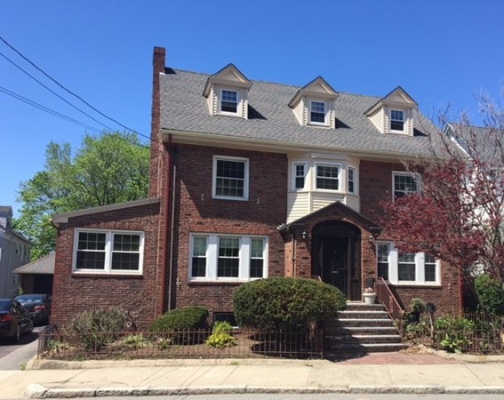 18 Pierce Street Malden, MA 02148 - Photo 1 of 29 a front view of a house with a yard