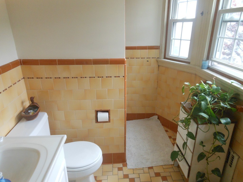 18 Pierce Street Malden, MA 02148 - Photo 16 of 29 a bathroom with a toilet and a shower