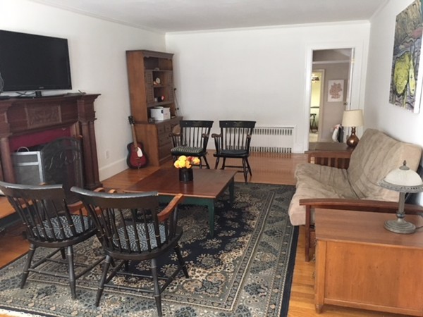 18 Pierce Street Malden, MA 02148 - Photo 2 of 29 a view of a livingroom with furniture and a flat screen tv