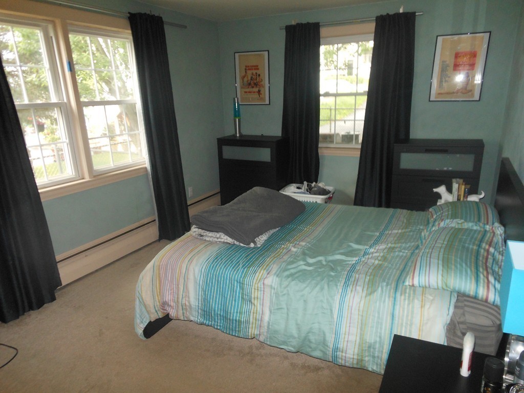 18 Pierce Street Malden, MA 02148 - Photo 23 of 29 a bedroom with a bed and a window
