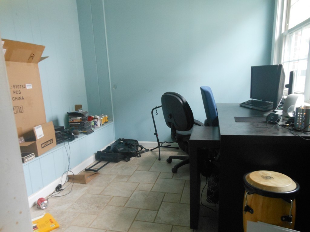 18 Pierce Street Malden, MA 02148 - Photo 25 of 29 a view of a workspace with furniture and a window