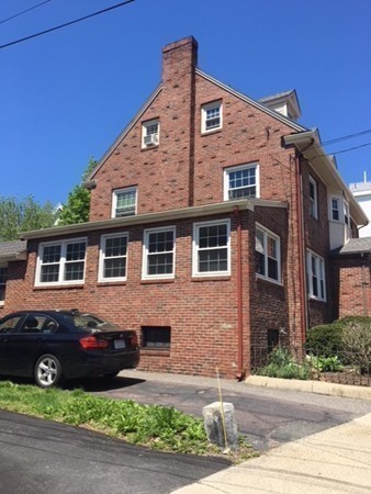 18 Pierce Street Malden, MA 02148 - Photo 28 of 29 a front view of a house with garden