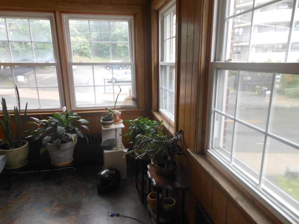 18 Pierce Street Malden, MA 02148 - Photo 7 of 29 a living room filled with furniture and a window
