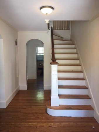 18 Pierce Street Malden, MA 02148 - Photo 8 of 29 a view of entryway and hall with wooden floor
