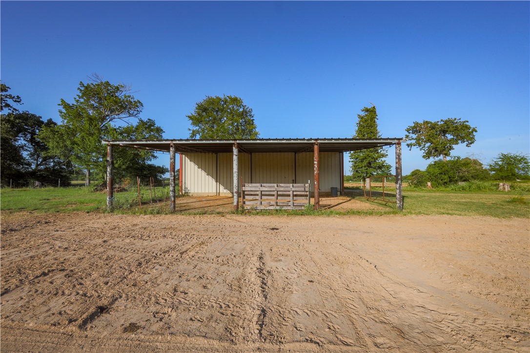 16403-16515 Macey Road Hearne, TX 77859 - Photo 45 of 46 a backyard of a house with lots of green space
