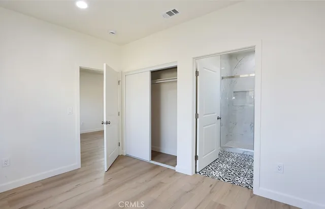 a view of empty room with windows