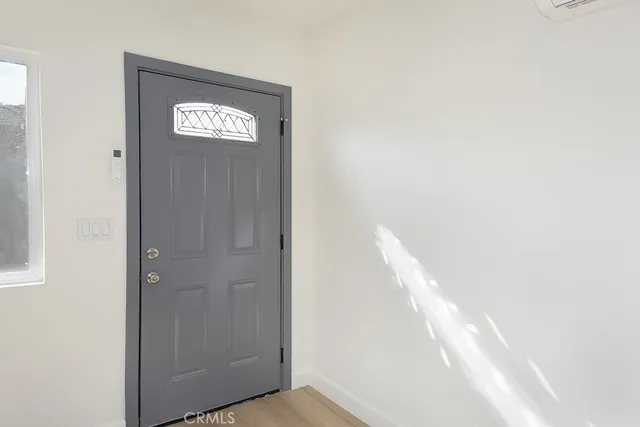 a kitchen with stainless steel appliances a stove a microwave and cabinets