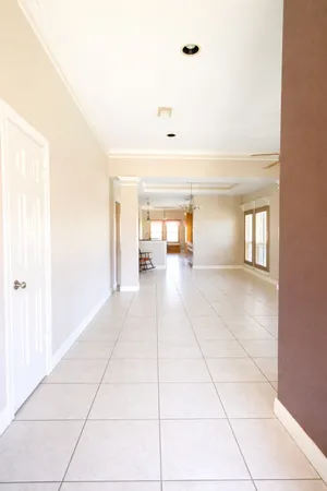 a view of livingroom with an empty space and a window
