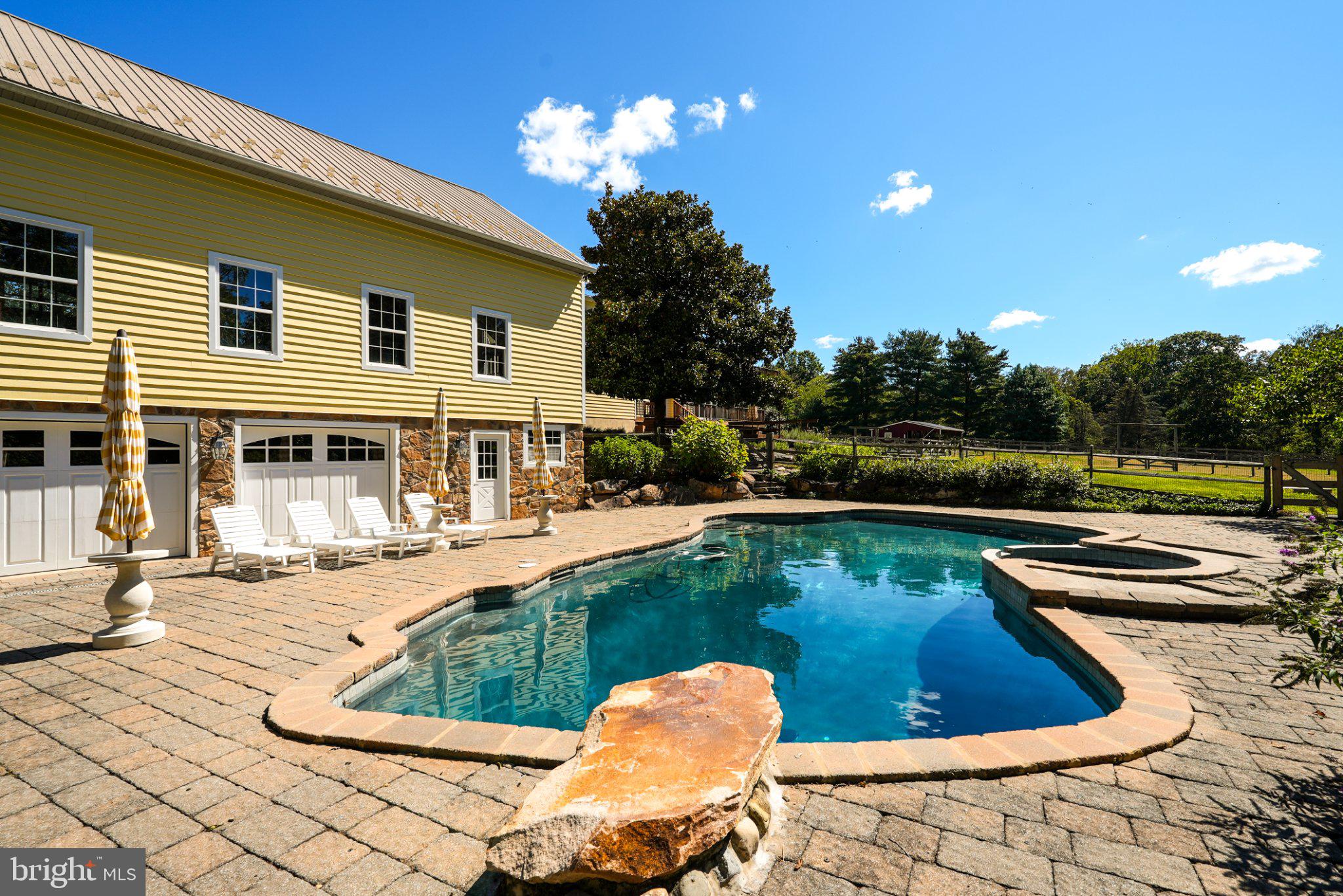 928 Swamp Road Furlong, PA 18925 - Photo 19 of 85 Sunny retreat with a sparkling pool.