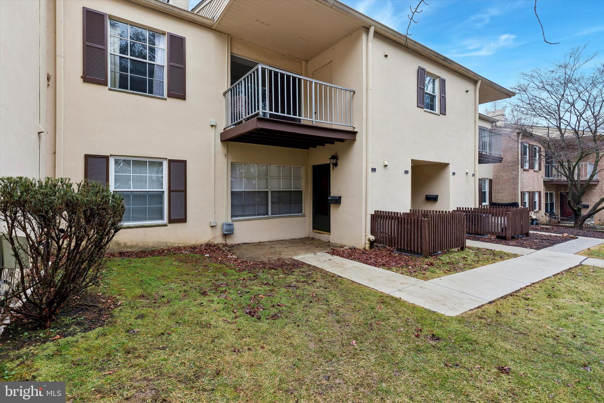 a view of an house with backyard and kitchen