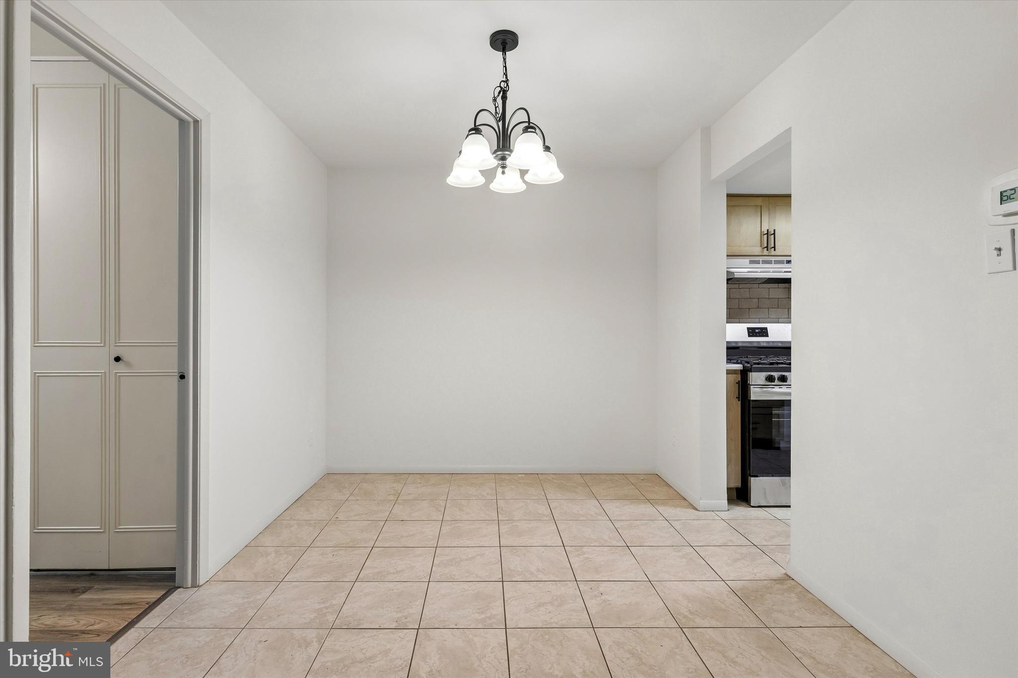 521 Old Forge Crossing Wayne, PA 19087 - Photo 4 of 15 a view of an empty room with a window