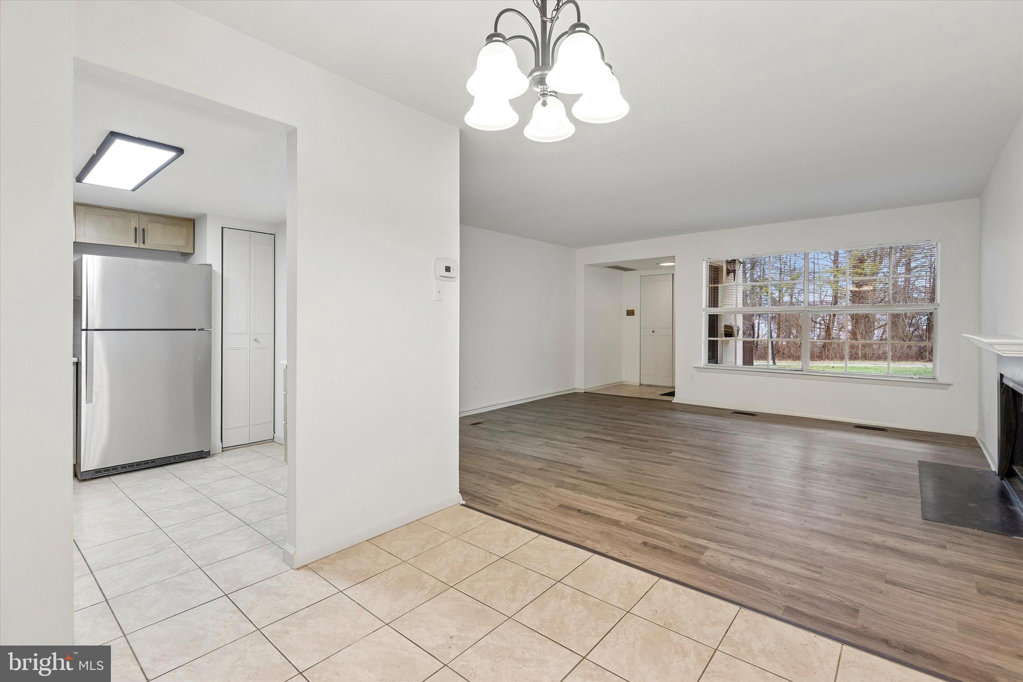 521 Old Forge Crossing Wayne, PA 19087 - Photo 5 of 15 a view of an empty room with a window