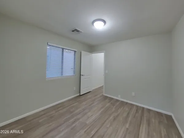 a bathroom with a shower and a bath tub