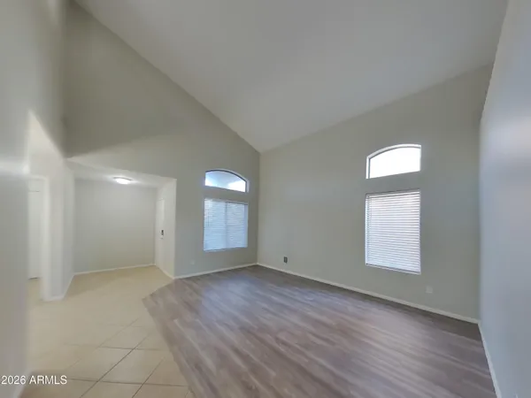 a bathroom with a double vanity sink toilet mirror and shower