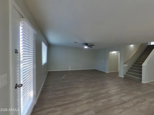 a picture of a bench in front of a window