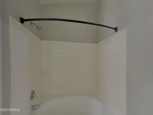 a spacious bathroom with a double vanity sink mirror and double