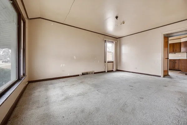 a view of a room with a large window