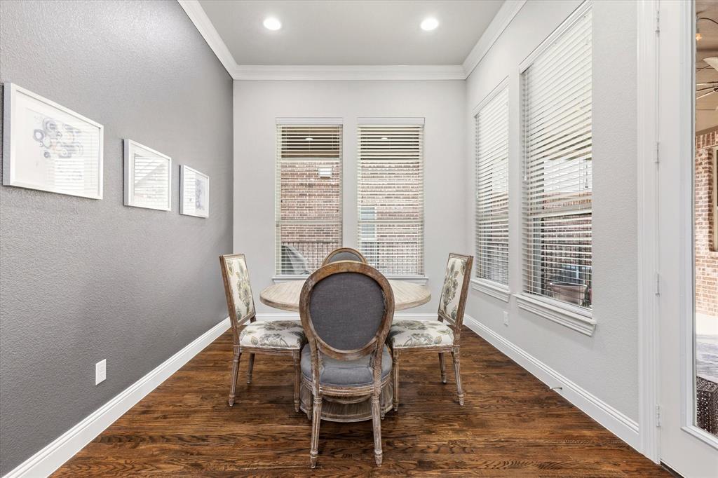 1108 Granada Drive Allen, TX 75013 - Photo 12 of 40 a dining room with furniture and wooden floor
