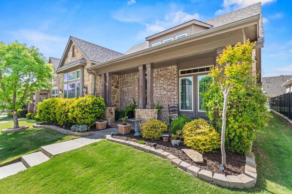 1108 Granada Drive Allen, TX 75013 - Photo 2 of 40 a garden view with a seating space
