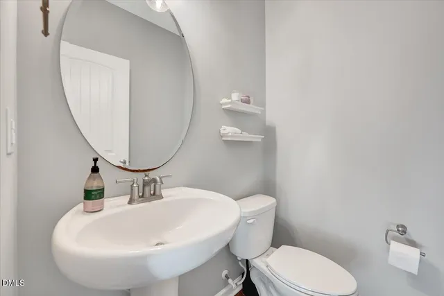 a living room with furniture and large window