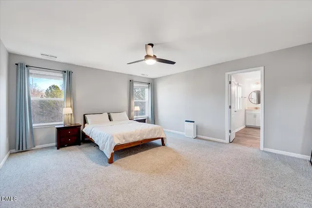 a view of workspace with wooden floor windows
