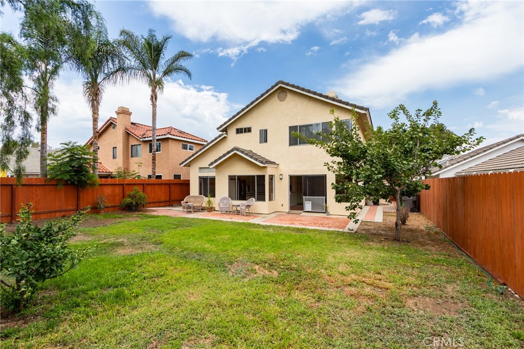 5349 Gooseberry Way Oceanside, CA 92057 - Photo 28 of 35 a front view of a house with a yard