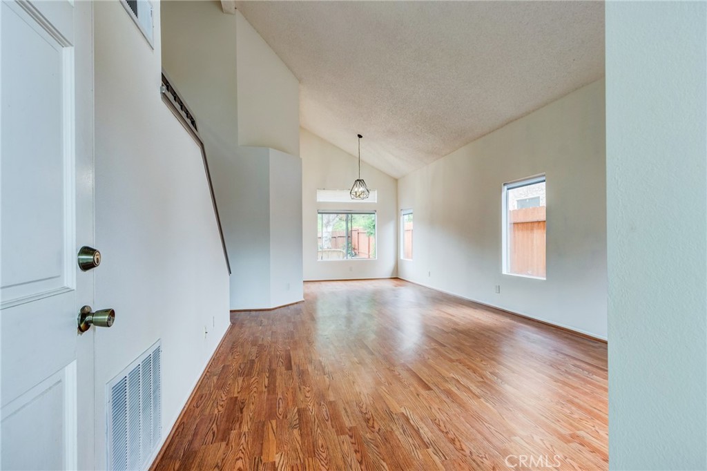 5349 Gooseberry Way Oceanside, CA 92057 - Photo 5 of 35 a view of an entryway with wooden floor