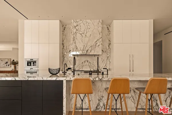 a view of kitchen and living room