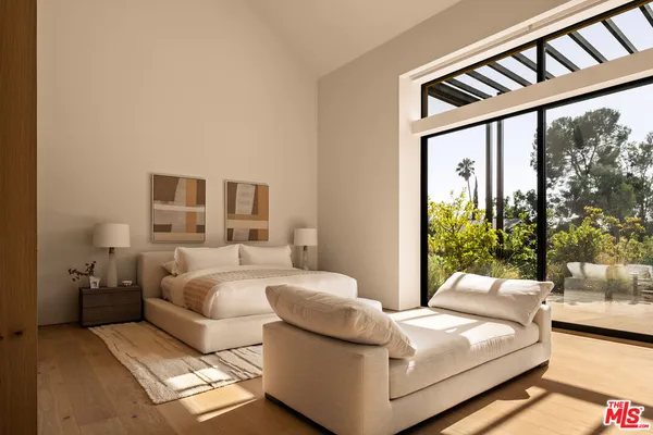 a bathroom with a tub and shower