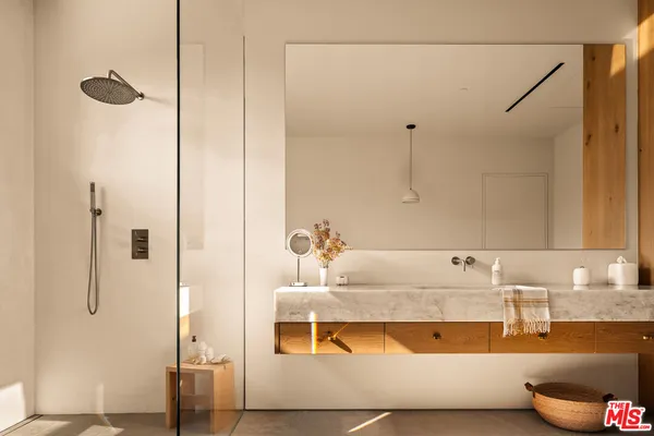 a room with furniture and wall painting