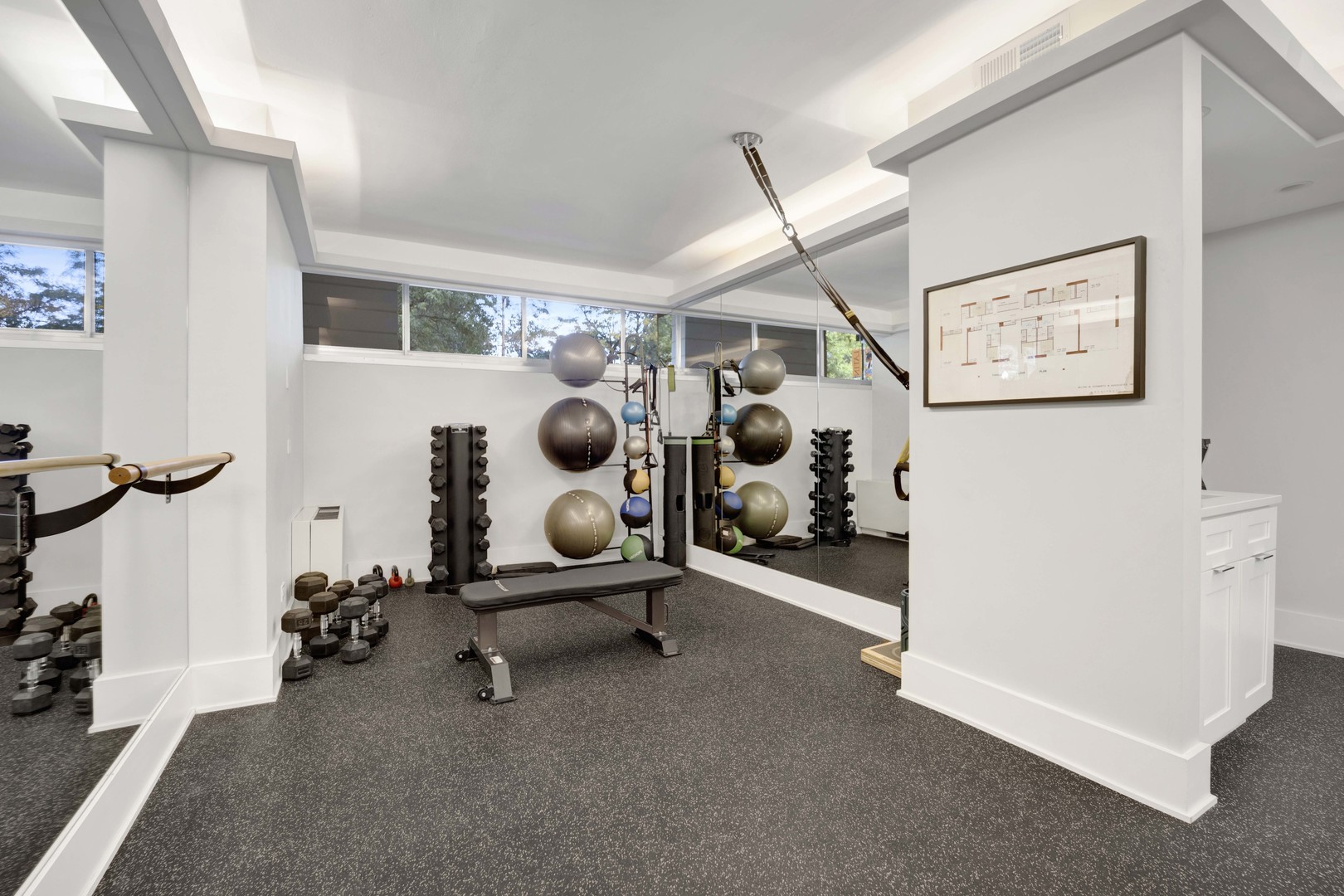1555 North Dearborn Parkway, Unit 4C Chicago, IL 60610 - Photo 13 of 16 a room with gym equipment and view of living room