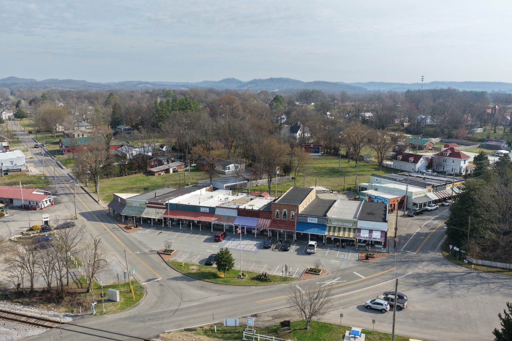 317 Maple Street Bell Buckle, TN 37020 - Photo 4 of 4 an aerial view of residential houses with outdoor space and trees
