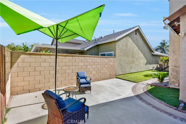 a view of yard with patio