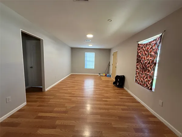 a view of an empty room and window