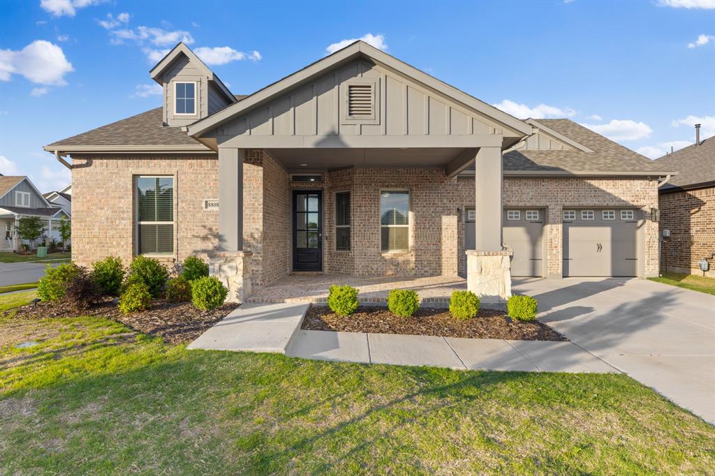 8808 Royal Star Road Rowlett, TX 75089 - Photo 10 of 40 a front view of a house with a yard