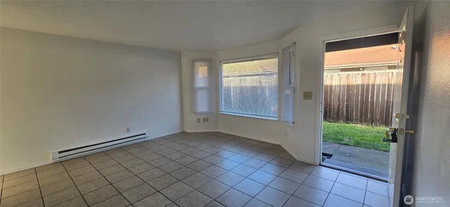 a white refrigerator freezer sitting in a kitchen