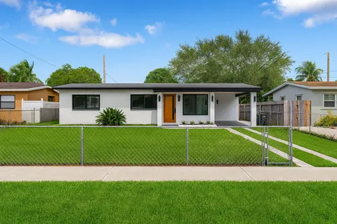 a house view with a garden space