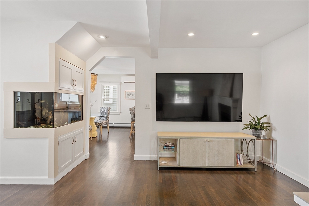 32 Maple Avenue Nahant, MA 01908 - Photo 11 of 37 a living room with furniture and a flat screen tv