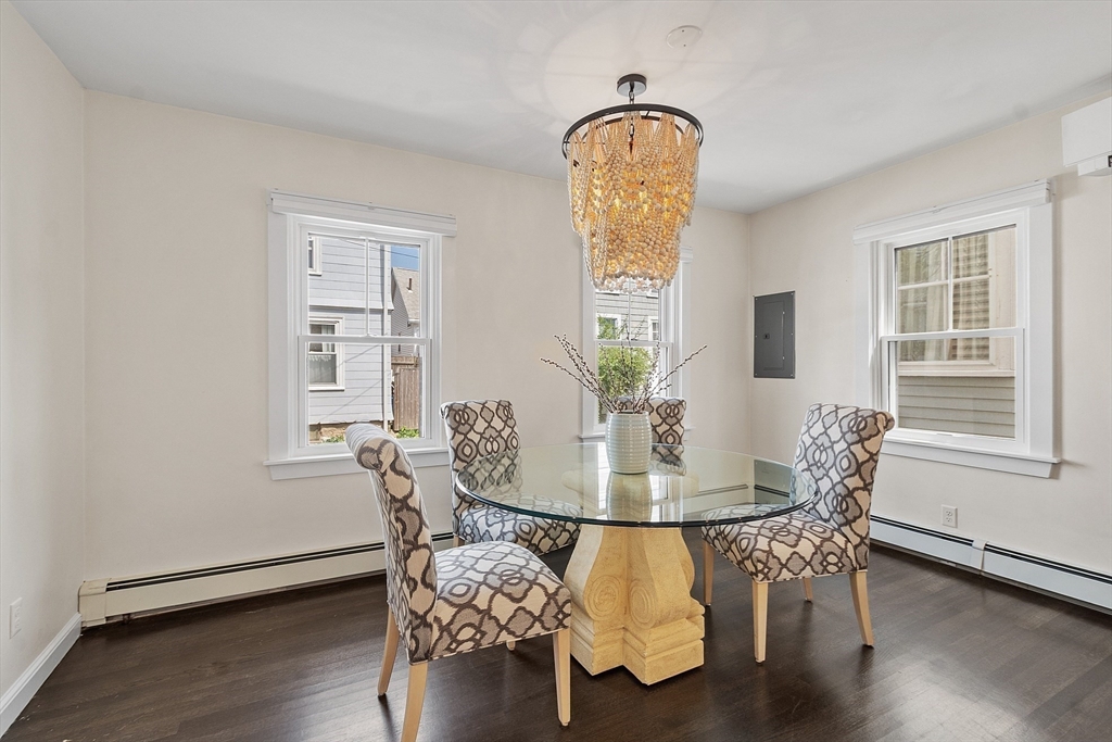 32 Maple Avenue Nahant, MA 01908 - Photo 15 of 37 a view of a dining room with furniture and wooden floor
