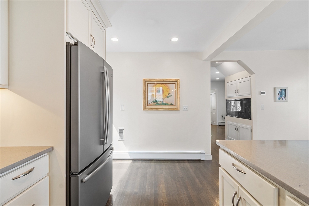 32 Maple Avenue Nahant, MA 01908 - Photo 19 of 37 a view of a kitchen with wooden floor and electronic appliances