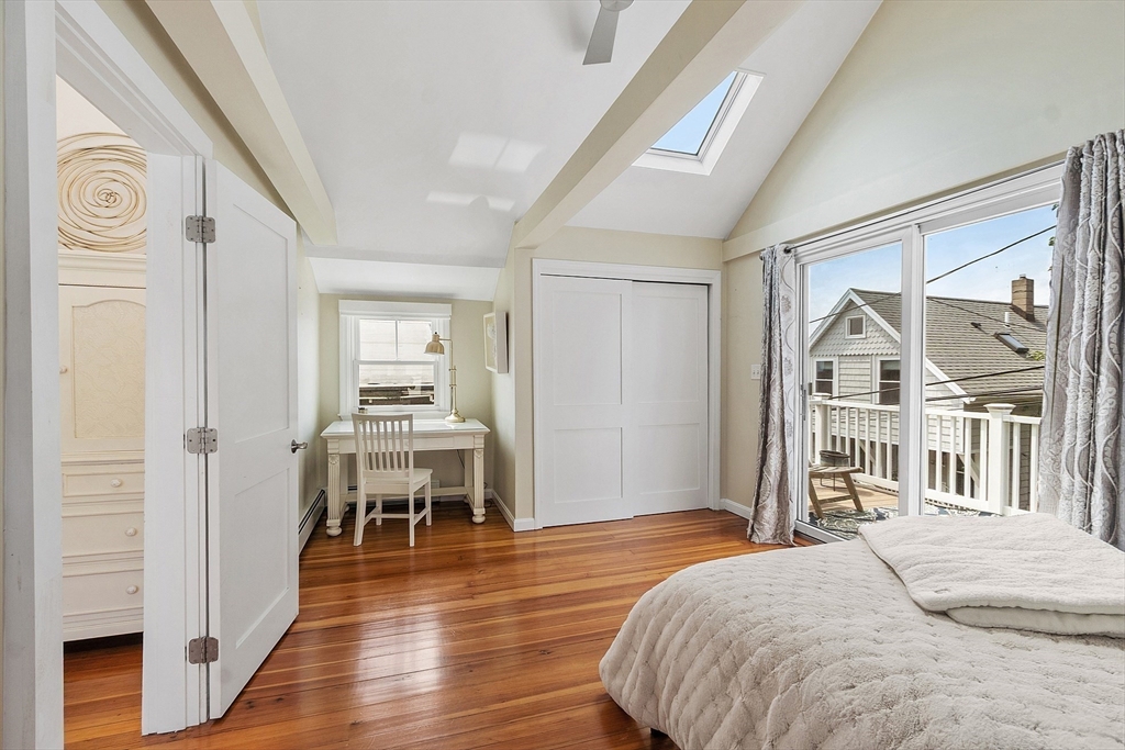 32 Maple Avenue Nahant, MA 01908 - Photo 23 of 37 a bedroom with a bed and a mirror