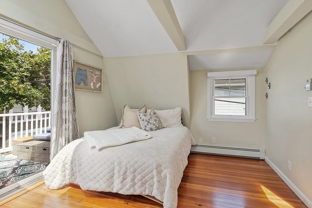 32 Maple Avenue Nahant, MA 01908 - Photo 24 of 37 a bedroom with a bed and a window